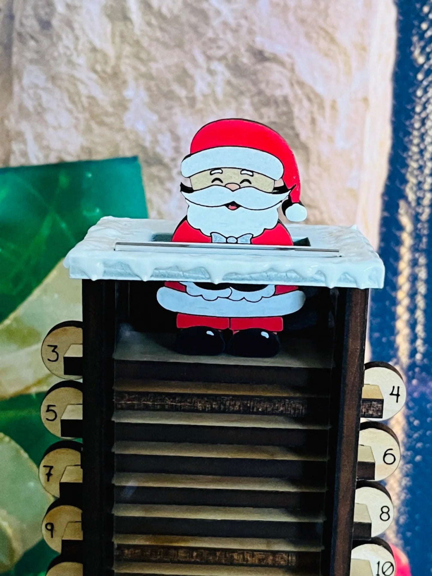 Santa Claus down the chimney countdown advent calendar