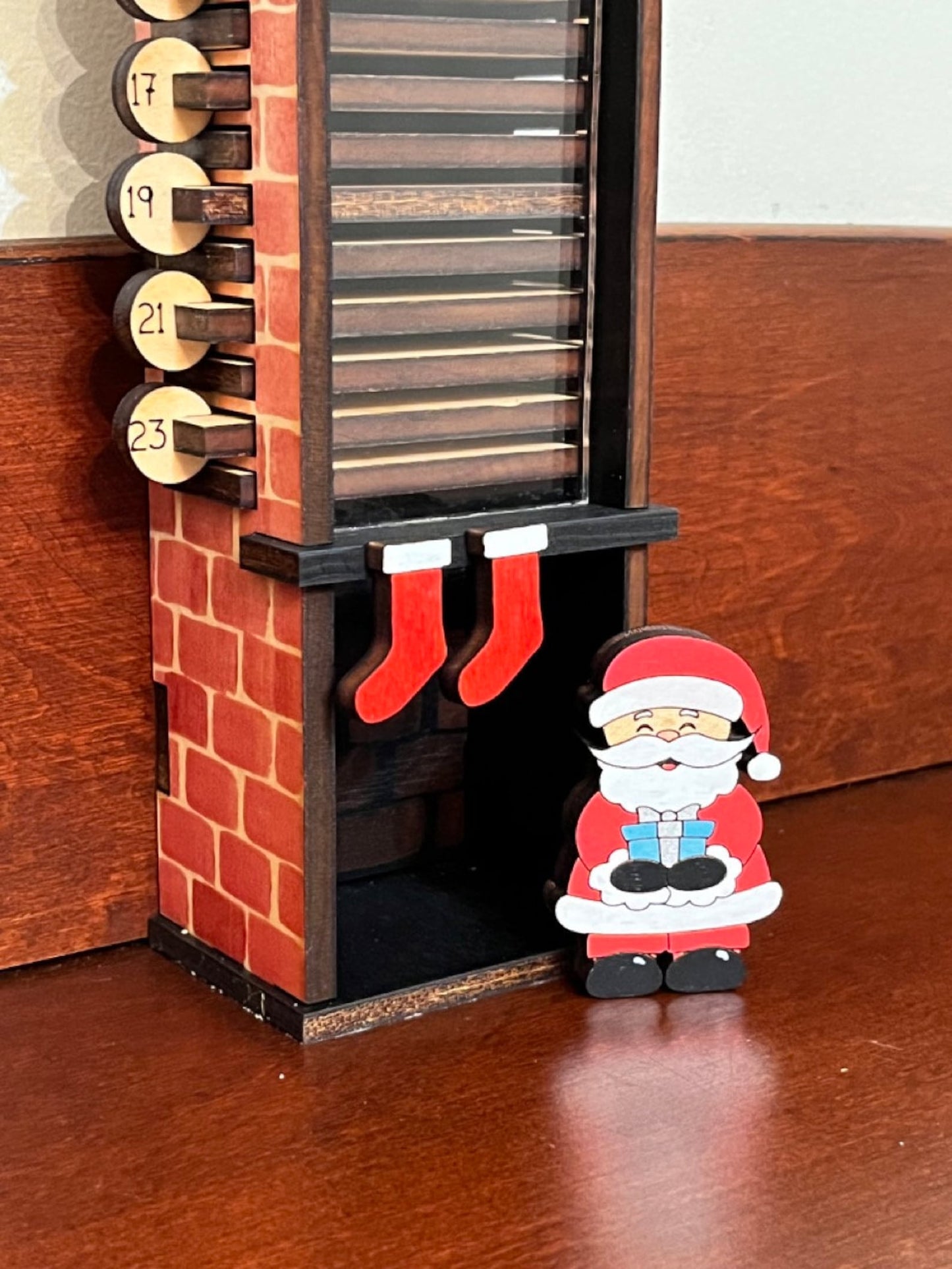 Santa Claus down the chimney countdown advent calendar